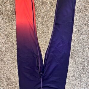 ZYIA light n tight leggings in Red and Purple Ombre